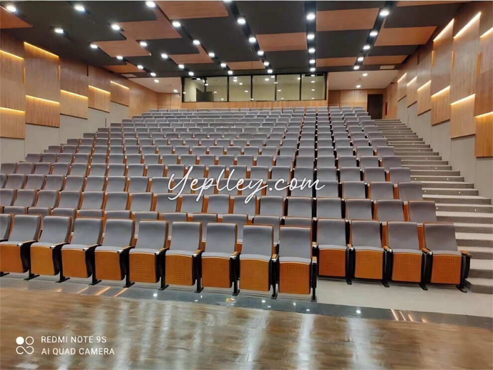 Detail shot of the high-value chair auditorium seat and backrest materials chosen for the Peruvian court.