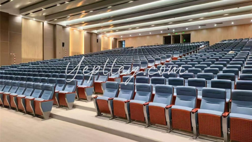 Multilayer plywood shell on auditorium seat and backrest