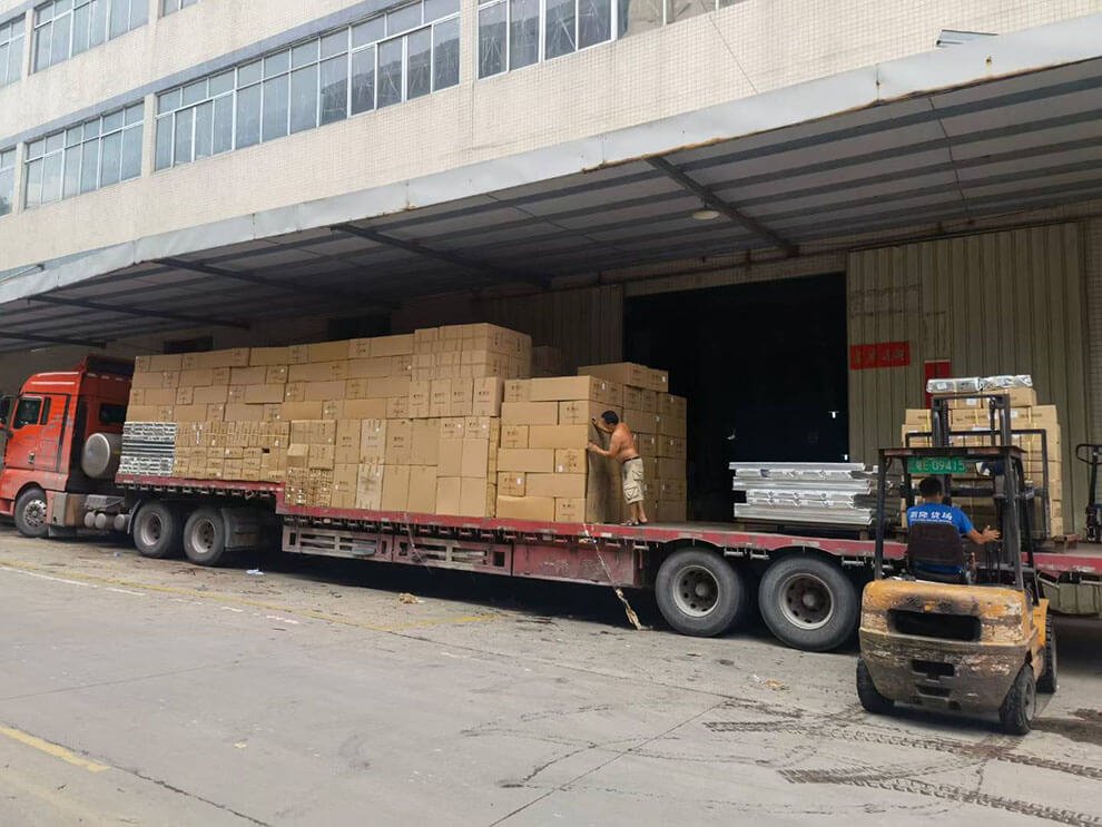 Stacked classroom desks ready for shipment from Yeplley factory
