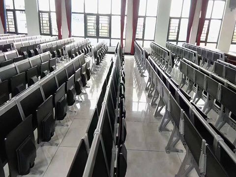 Close-up of aluminum alloy legs on conference room chairs for strength and durability