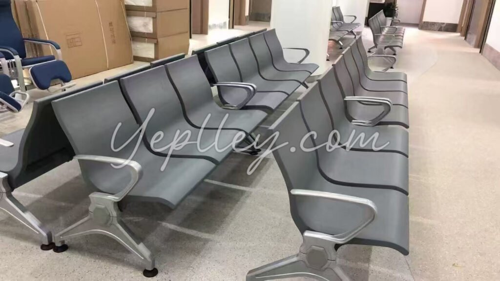 Three-seat airport waiting bench installed in modern terminal hall