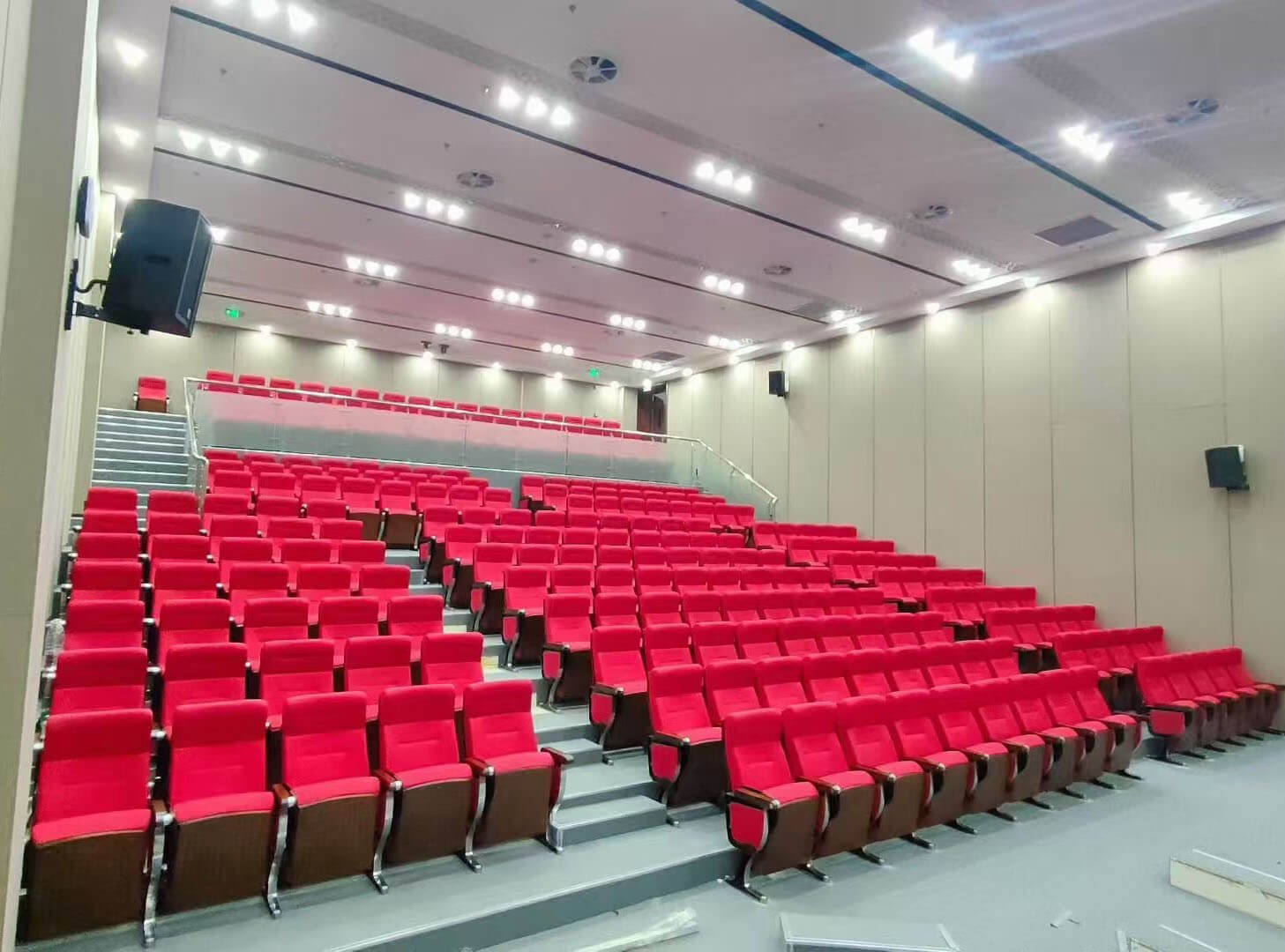 Moisture-proof auditorium chairs with molded foam and plywood shell