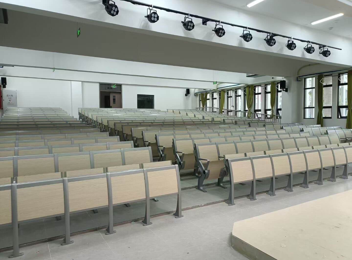 upgraded academic auditorium seating with aluminum legs and plywood shell